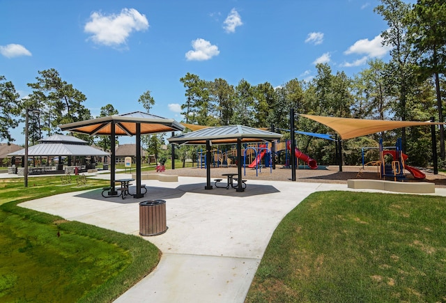 view of home's community featuring a gazebo, a playground, and a lawn