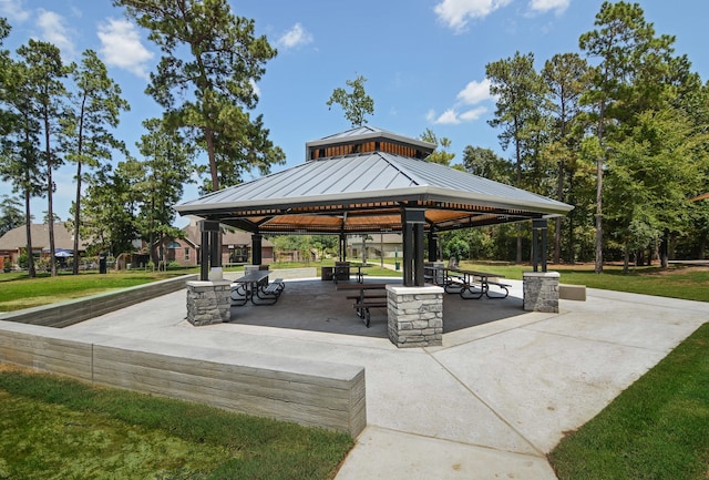 view of property's community featuring a gazebo and a yard