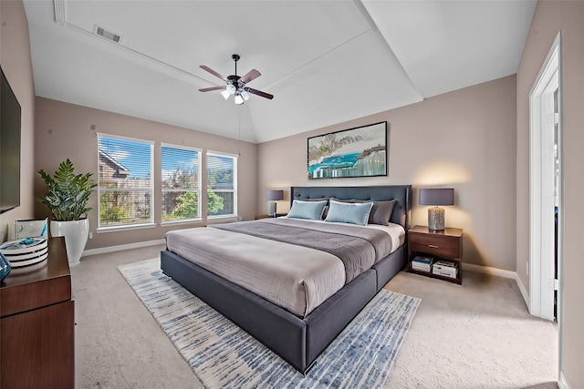 carpeted bedroom with lofted ceiling and ceiling fan