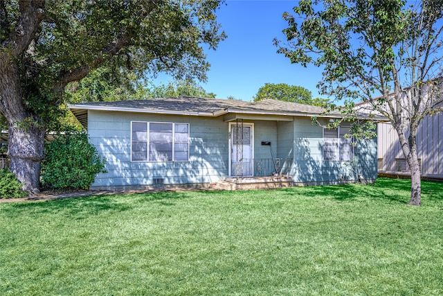 ranch-style home with a front yard