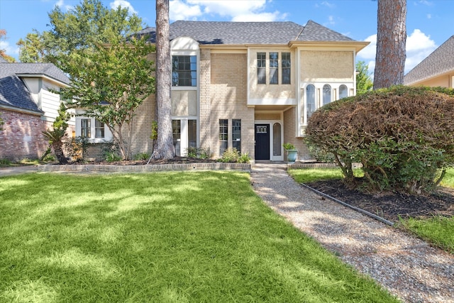 view of front facade with a front lawn