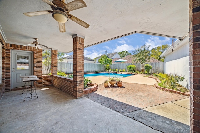 view of patio with ceiling fan