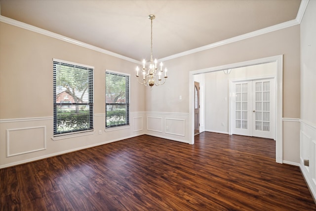 unfurnished dining area featuring a notable chandelier, crown molding, and dark hardwood / wood-style flooring