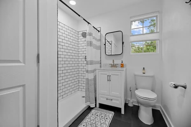 bathroom featuring vanity, a shower with curtain, toilet, and tile patterned floors