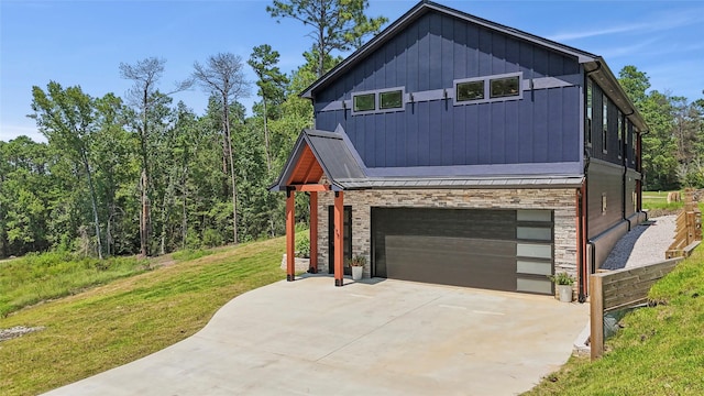 exterior space featuring a garage and a yard