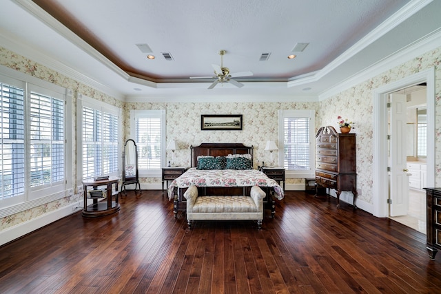 bedroom featuring ornamental molding, ceiling fan, and dark wood-type flooring