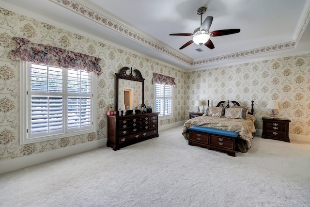 bedroom featuring ceiling fan, ornamental molding, and carpet flooring