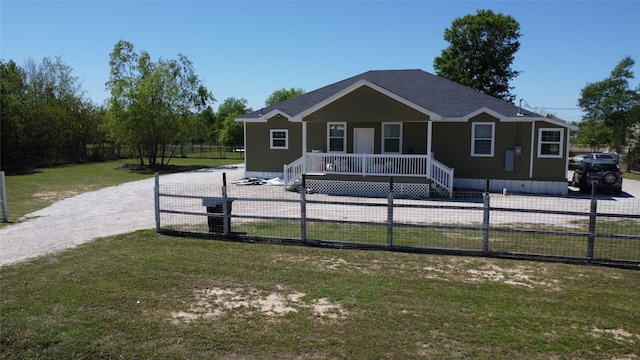 view of front of property featuring a porch and a front lawn