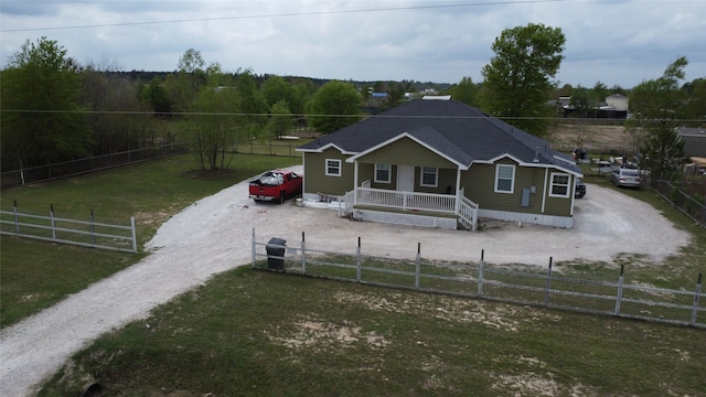 view of front of home featuring a front lawn and covered porch