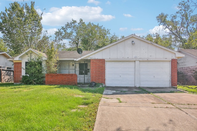 ranch-style home with a front yard and a garage