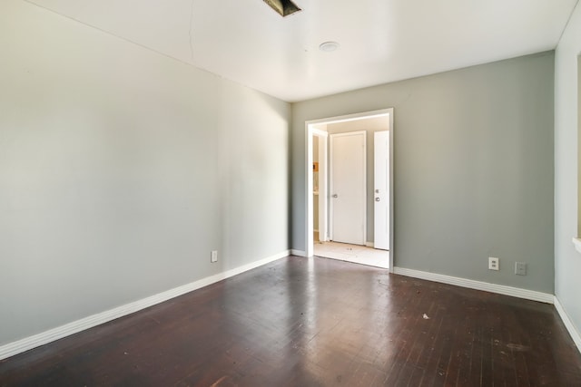 empty room featuring hardwood / wood-style flooring