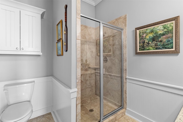 bathroom featuring tile patterned floors, walk in shower, and toilet