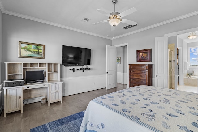 bedroom with ceiling fan, connected bathroom, hardwood / wood-style floors, and crown molding