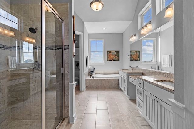 bathroom with vanity, separate shower and tub, and tile patterned floors