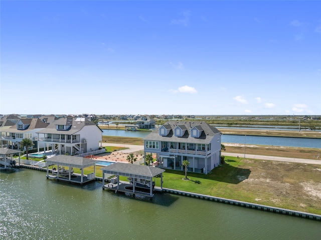drone / aerial view featuring a water view