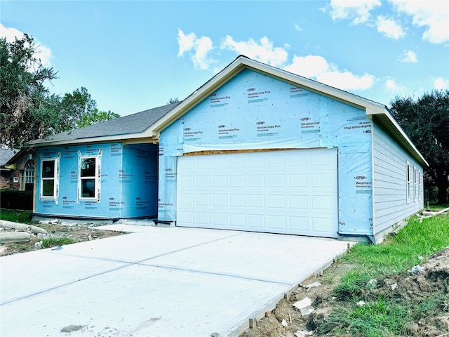 property under construction featuring a garage