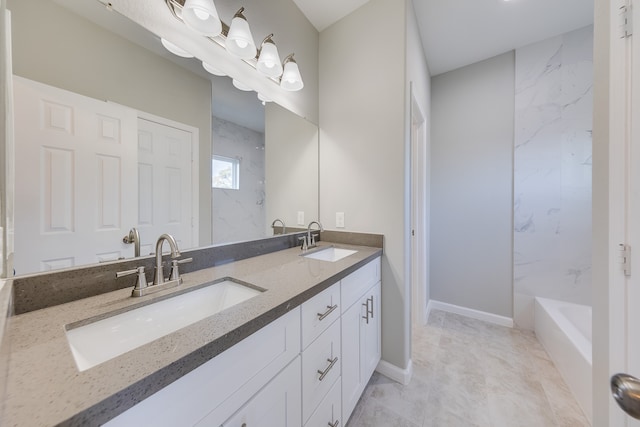 bathroom with vanity and independent shower and bath