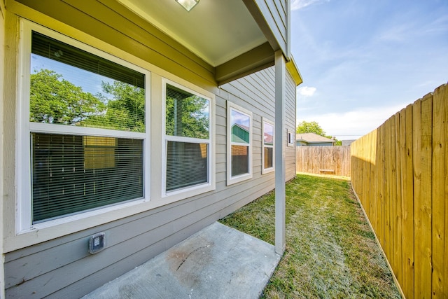 view of home's exterior with a yard