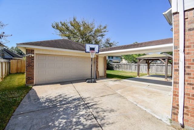 garage with a yard