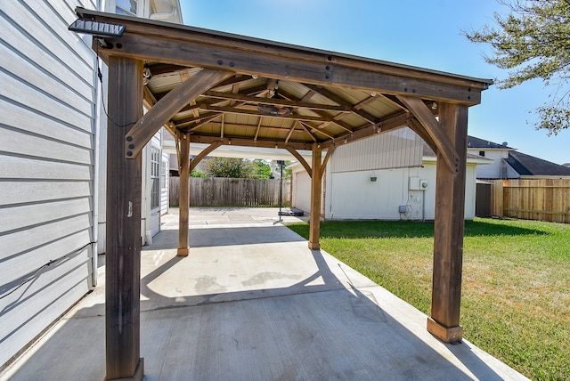 view of parking featuring a gazebo and a yard