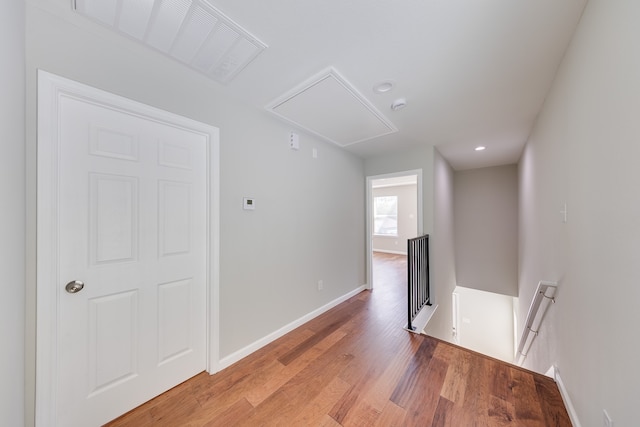 hallway featuring hardwood / wood-style floors