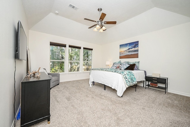 bedroom featuring ceiling fan, carpet floors, and lofted ceiling