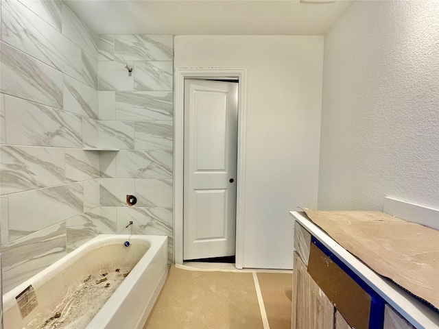 bathroom with tile patterned flooring and vanity