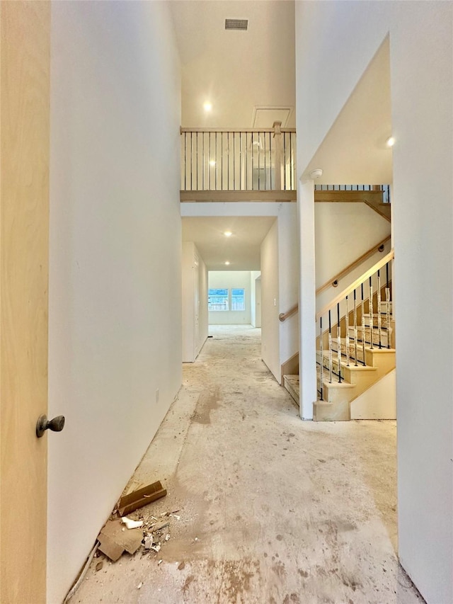 interior space with a high ceiling