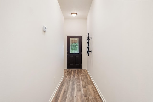 doorway to outside with hardwood / wood-style floors