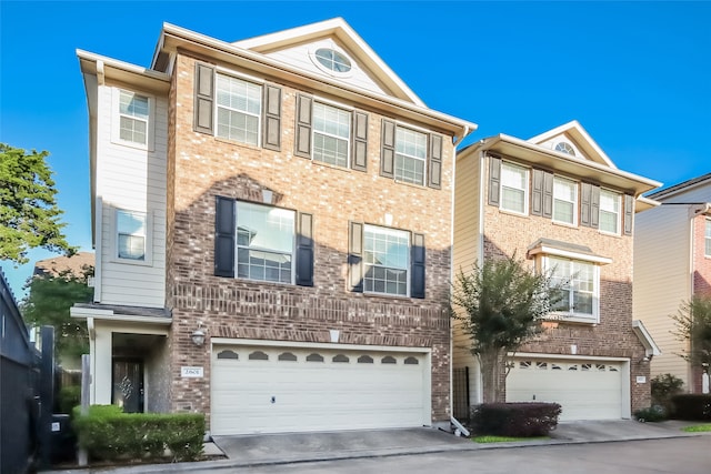 multi unit property featuring a garage