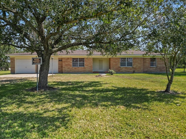 single story home with a front lawn and a garage