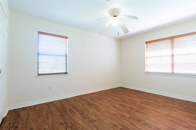 unfurnished room featuring hardwood / wood-style floors, plenty of natural light, and ceiling fan