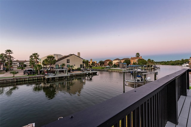 dock area with a water view