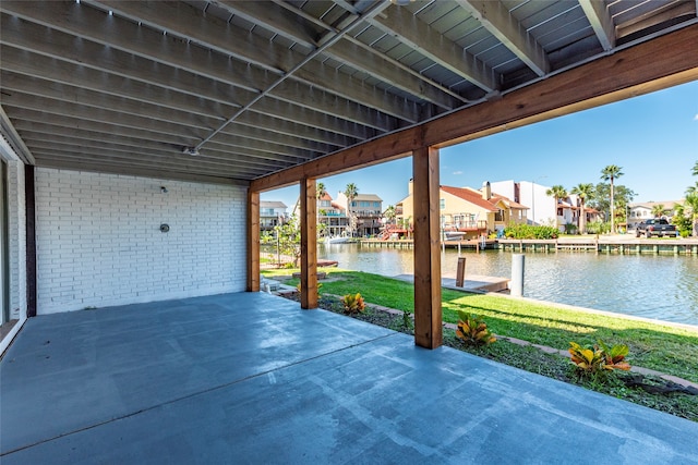 view of patio / terrace with a water view