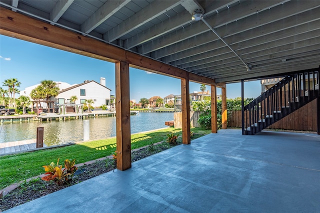 view of patio featuring a water view