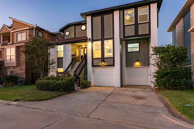 view of front of property with a garage