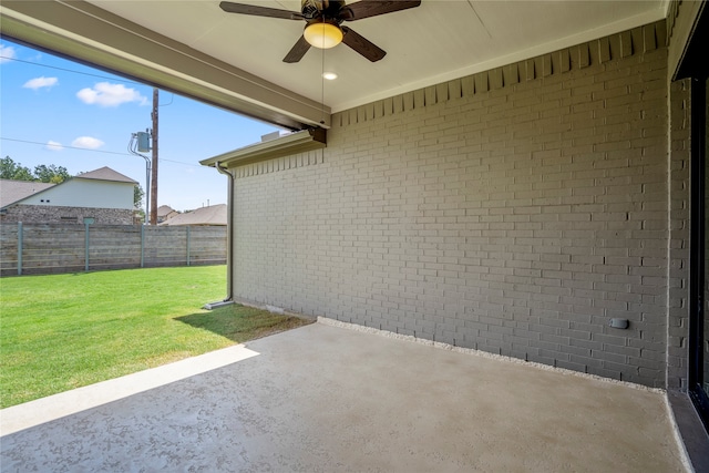 view of patio featuring ceiling fan