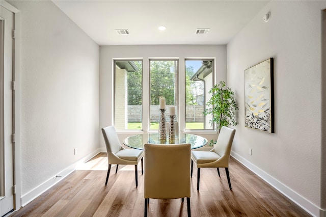 dining space featuring light hardwood / wood-style floors