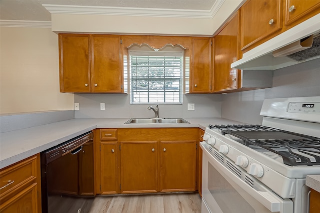 kitchen featuring light wood-type flooring, gas range gas stove, sink, dishwasher, and ornamental molding