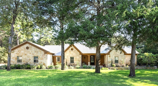 view of front of home with a front lawn