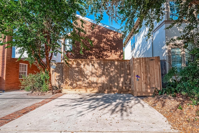 2300 Driscoll, Houston, TX 77019 - view of home's exterior featuring a patio and fence