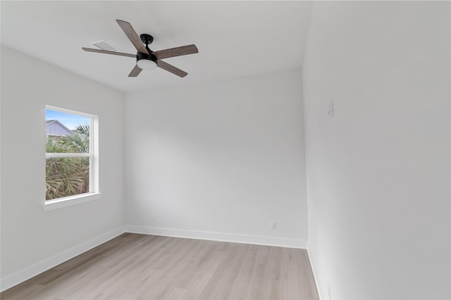 empty room with light hardwood / wood-style flooring and ceiling fan