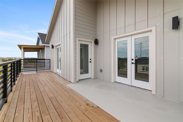 wooden deck featuring french doors