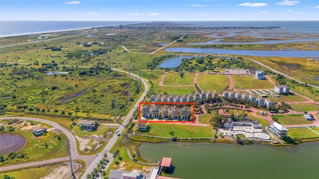 drone / aerial view with a water view