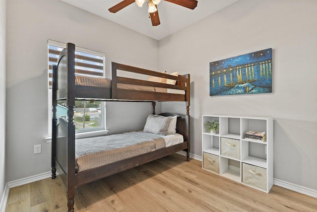 bedroom featuring wood-type flooring and ceiling fan