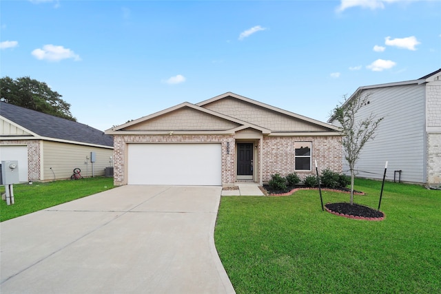 view of front of house featuring a front yard and a garage