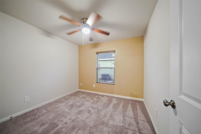 unfurnished room with light carpet and ceiling fan