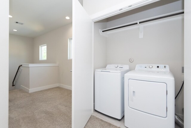 3344 Pinemont Dr, Houston, TX 77018 - washroom featuring light colored carpet, washing machine and clothes dryer, and recessed lighting