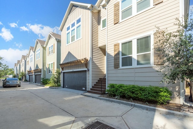 view of property exterior with a garage