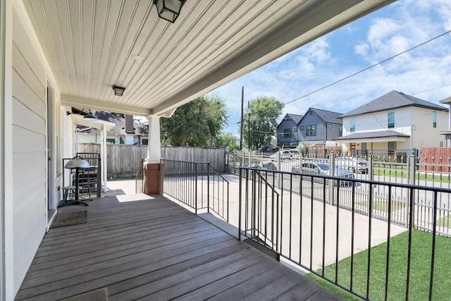 deck featuring a lawn